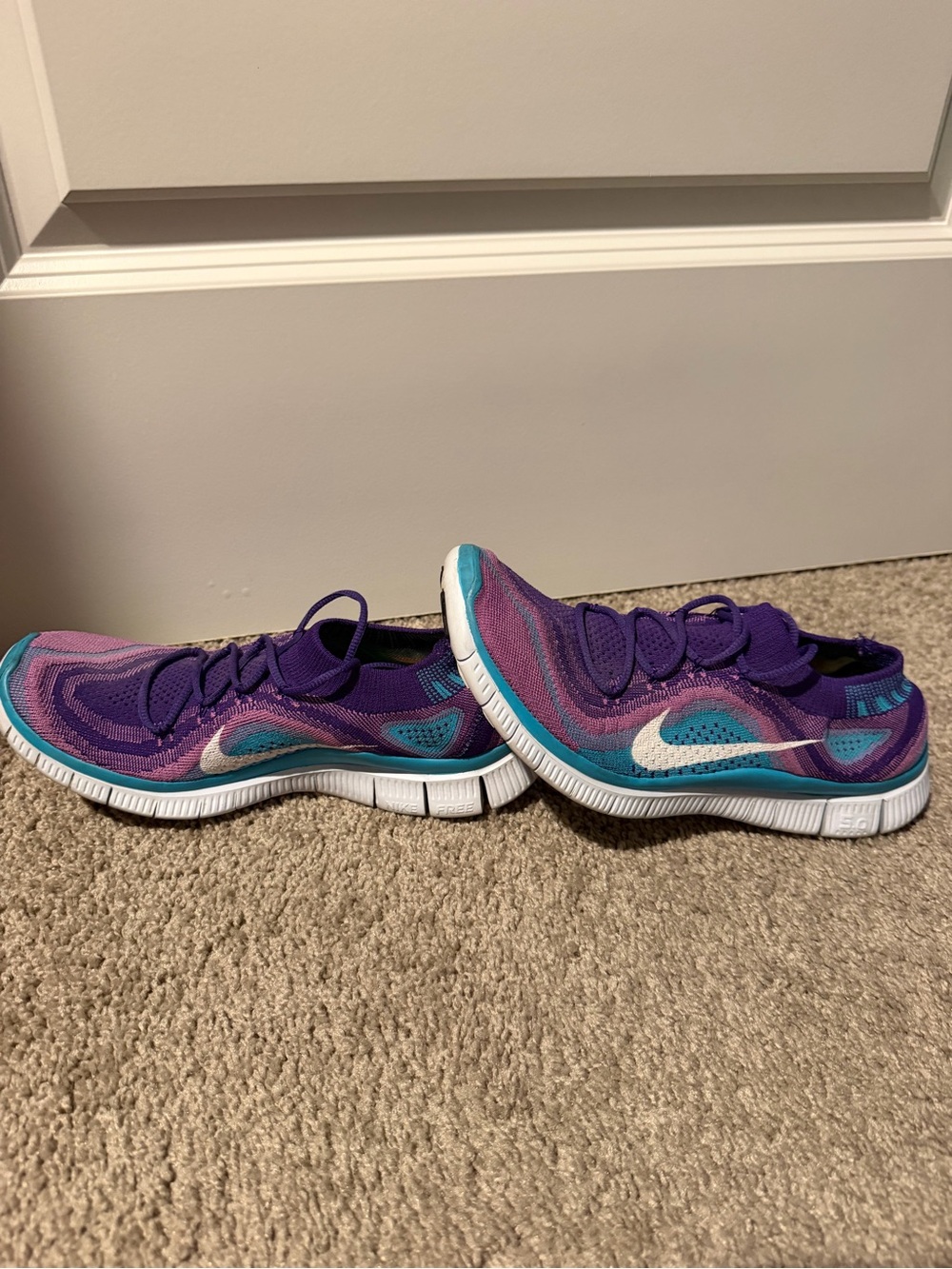 Nike Women’s Purple, Teal & Pink Flexible Running Shoes